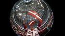 A supporter of Latvia cheers his team during the second period of their men's ice hockey World Championship Group B game against the U.S. at Minsk Arena in Minsk May 15,