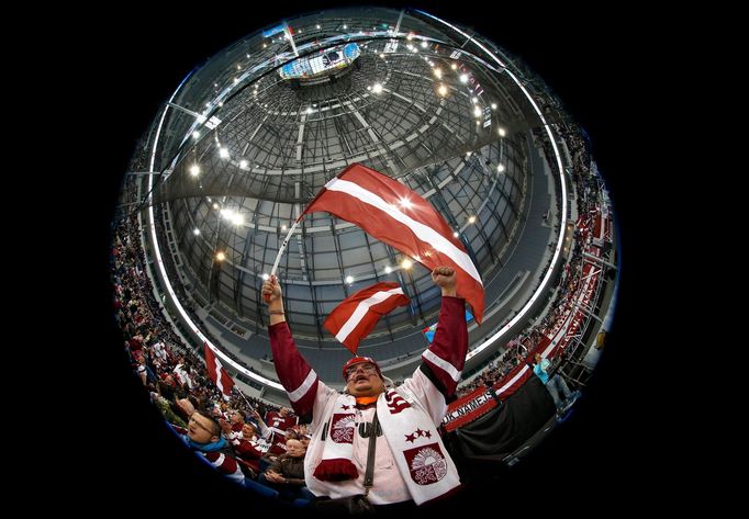 A supporter of Latvia cheers his team during the second period of their men's ice hockey World Championship Group B game against the U.S. at Minsk Arena in Minsk May 15,