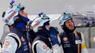 Crew members of the Aston Martin Vantage GTE Number 99 react after the crash and the withdrawal of their car during the Le Mans 24-hour sportscar race in Le Mans, central