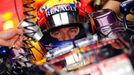 Red Bull Formula One driver Mark Webber waits in his car dur