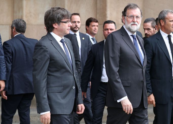 Katalánský premiér Carles Puigdemont (vlevo) a španělský premiér Mariano Rajoy.