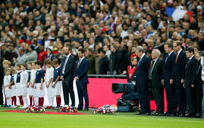 General view of FA chairman Greg Dyke, Britain's Prime Minister David Cameron, England manager Roy Hodgson and Britain's Prince William after laying floral tributes