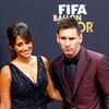 Barcelona's Messi of Argentina, a nominee for the 2014 FIFA World Player of the Year, arrives with partner Roccuzzo for the FIFA Ballon d'Or 2014 soccer awards ceremony in Zurich