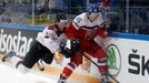 Latvia’s Kristaps Sotnieks in action with Czech Republic's Radim Simek.