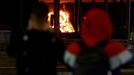 People take pictures while leaving London Luton airport as emergency services respond to a fire in the Terminal Car Park 2, in Luton, Britain, October 11, 2023.  REUTERS/