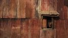 Rusted metal sheets cover side of traditional colonial-era Board House in Congo Town of Sierra Leone's capital Freetown