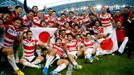 Japan celebrate victory after the match Reuters / Eddie Keogh Livepic