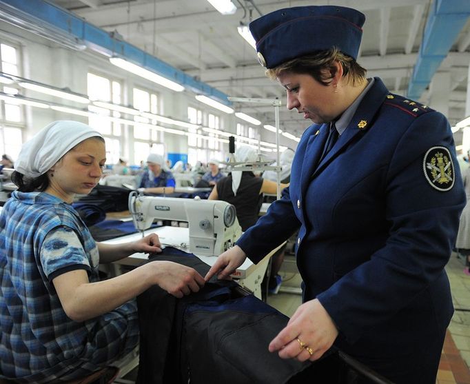 Ivanovo Region prison colony for convicted women IVANOVO REGION, RUSSIA. APRIL 25, 2012. A convicted woman and a guard in the sewing room at Women's Prison Colony No3 of the Ivanovo Region branch of the Russian Federal Service of Execution of Sentences (UFSIN).