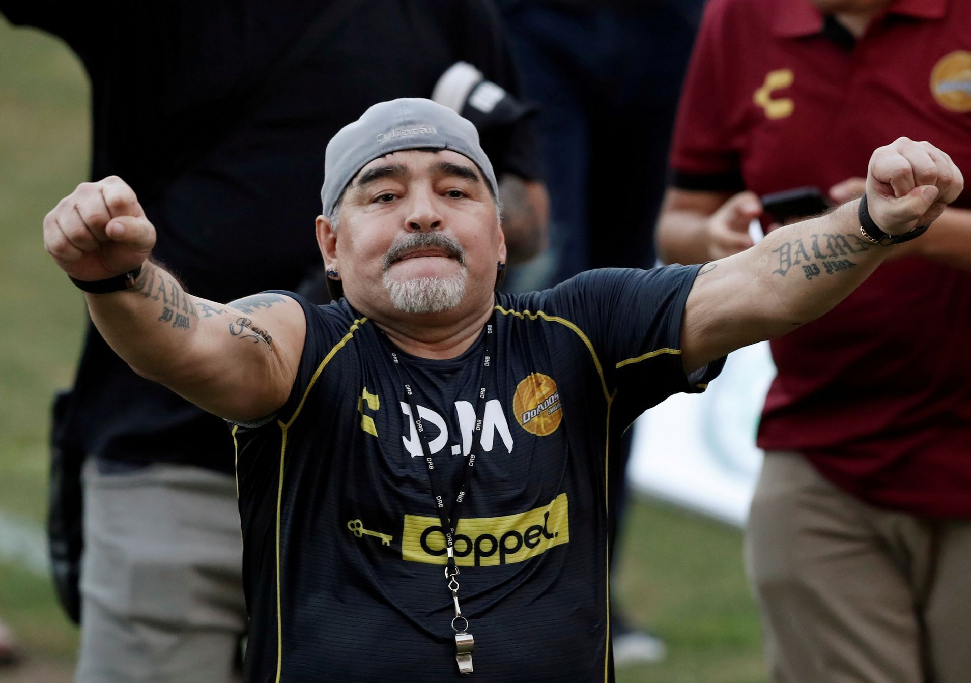 FILE PHOTO: Argentinian soccer legend Diego Armando Maradona reacts to fans during his first training session as coach of Dorados at the Banorte stadium in Culiacan, in the Mexican state of Sinaloa