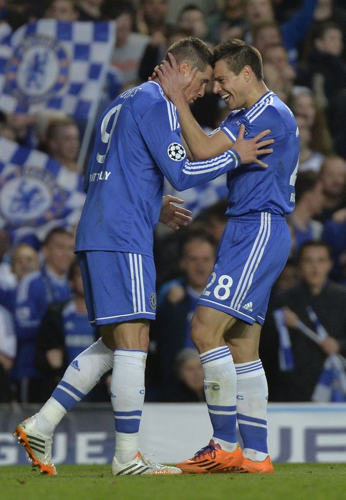 Chelsea's Fernando Torres is congratulated by Cesar Azpilicueta (R) after scoring a goal against Atletico Madrid during their Champion's League semi-final second leg socc