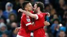 Manchester United's Jesse Lingard celebrates scoring their first goal with Juan Mata