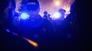 Protesters face off with police officers while marching outside the Democratic National Convention in Charlotte, North Carolina, September 4, 2012. REUTERS/Philip Scott Andrews (UNITED STATES - Tags: CRIME LAW CIVIL UNREST POLITICS ELECTIONS TPX IMAGES OF THE DAY) Published: Zář. 5, 2012, 5:12 dop.