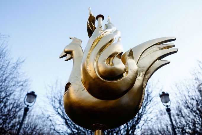 A new rooster is prepared to be installed at the top of the spire of the Notre-Dame de Paris Cathedral, which was ravaged by a fire in 2019 that sent its spire crumbling