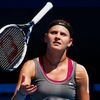 Lucie Safarova of the Czech Republic throws her racquet  up in the air during her women's singles match against Li Na of China at the Australian Open 2014 tennis tournament in Melbourne