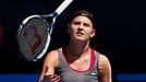 Lucie Safarova of the Czech Republic throws her racquet  up in the air during her women's singles match against Li Na of China at the Australian Open 2014 tennis tourname