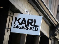 FILE PHOTO: A sign and logo are seen on the Karl Lagerfeld store in New York, U.S.
