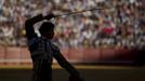 Spanish matador Daniel Luque prepares to drives a sword into a bull during a bullfight at the Maestranza bullring in Seville