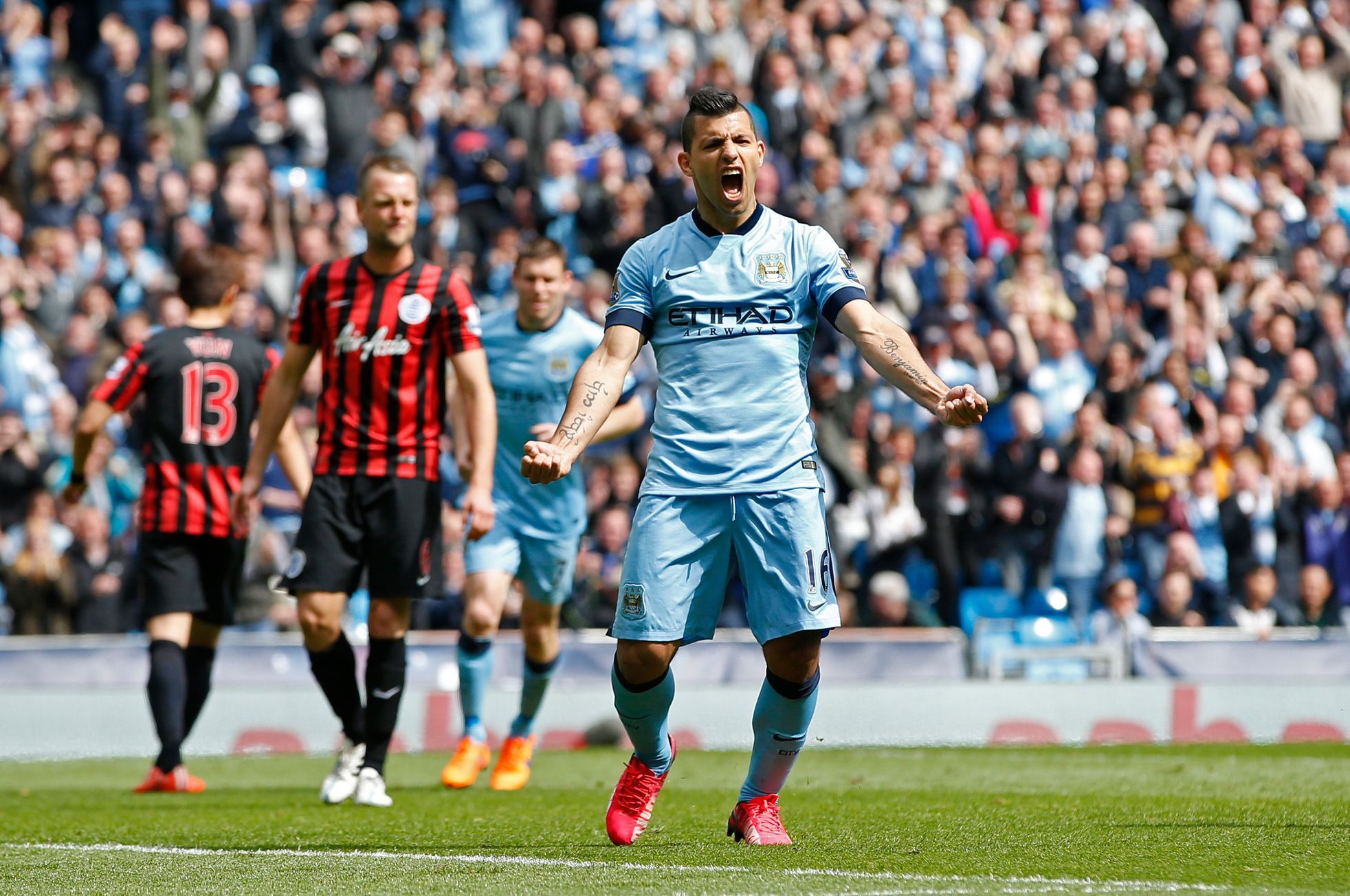 Football: Sergio Aguero celebrates after scoring the fourth goal for Manchester City and completing his hat trick