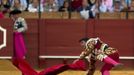 Spanish matador Jose Maria Manzanares falls in the arena during a bullfight at the Maestranza bullring in Seville