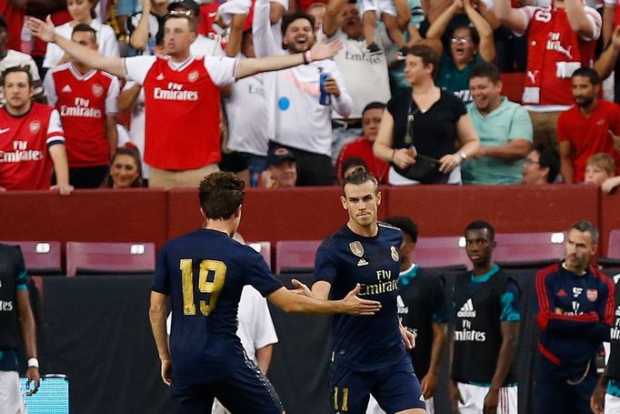 Jul 23, 2019; Landover, MD, USA; Real Madrid forward Gareth Bale (11) celebrates with Real Madrid defender Alvaro Odriozola (19) after scoring a goal against Arsenal in t