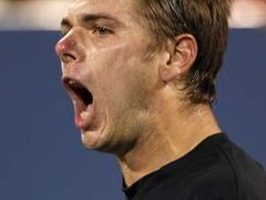 Stanislas Wawrinka se raduje na US Open při zápase s Robby Gineprim.