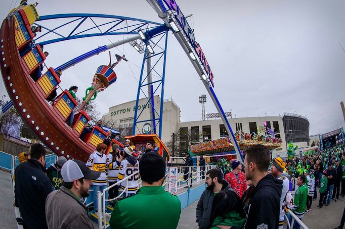 Jan 1, 2020; Dallas, Texas, USA; A view of the Dallas Stars fans and Nashville Predators fans and the fair park midway and the rides before the 2020 Winter Classic hockey