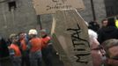 Arcelor Mittal workers from several Liege sites attend a general assembly in Liege January 28, 2013. ArcelorMittal the world's largest steel producer, plans to shut a coke plant and six finishing lines at its site in Liege Belgium, affecting 1,300 employees, the group said on last week. The sign reads, "Siderurgy Rest in peace RIP". REUTERS/Yves Herman (BELGIUM - Tags: BUSINESS CIVIL UNREST BUSINESS EMPLOYMENT) Published: Led. 28, 2013, 12:44 odp.