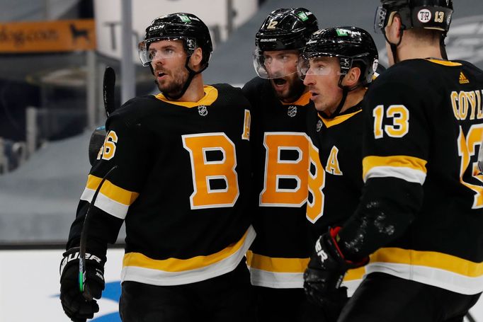 Apr 29, 2021; Boston, Massachusetts, USA; Boston Bruins center David Krejci (46) celebrates his goal with right wing Craig Smith (12) (center) and center Brad Marchand (6