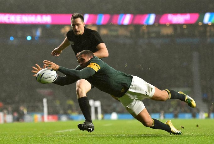 Bryan Habana of South Africa touches down a New Zealand kick over the try line during their Rugby World Cup semi-final match at Twickenham in London, Britain October 24,