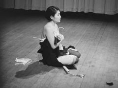 Yoko Ono performing Cut Piece in New York in 1965.