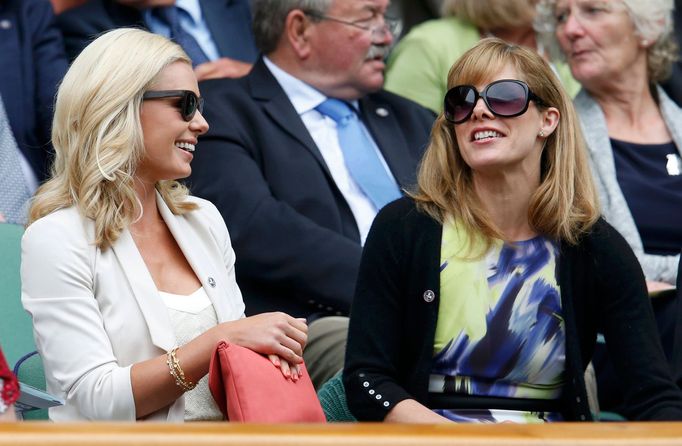 Singer Katherine Jenkins (L) and ballet dancer Darcey Bussell sit on Centre Court at the Wimbledon Tennis Championships, in London July 2, 2013. REUTERS/Suzanne Plunkett