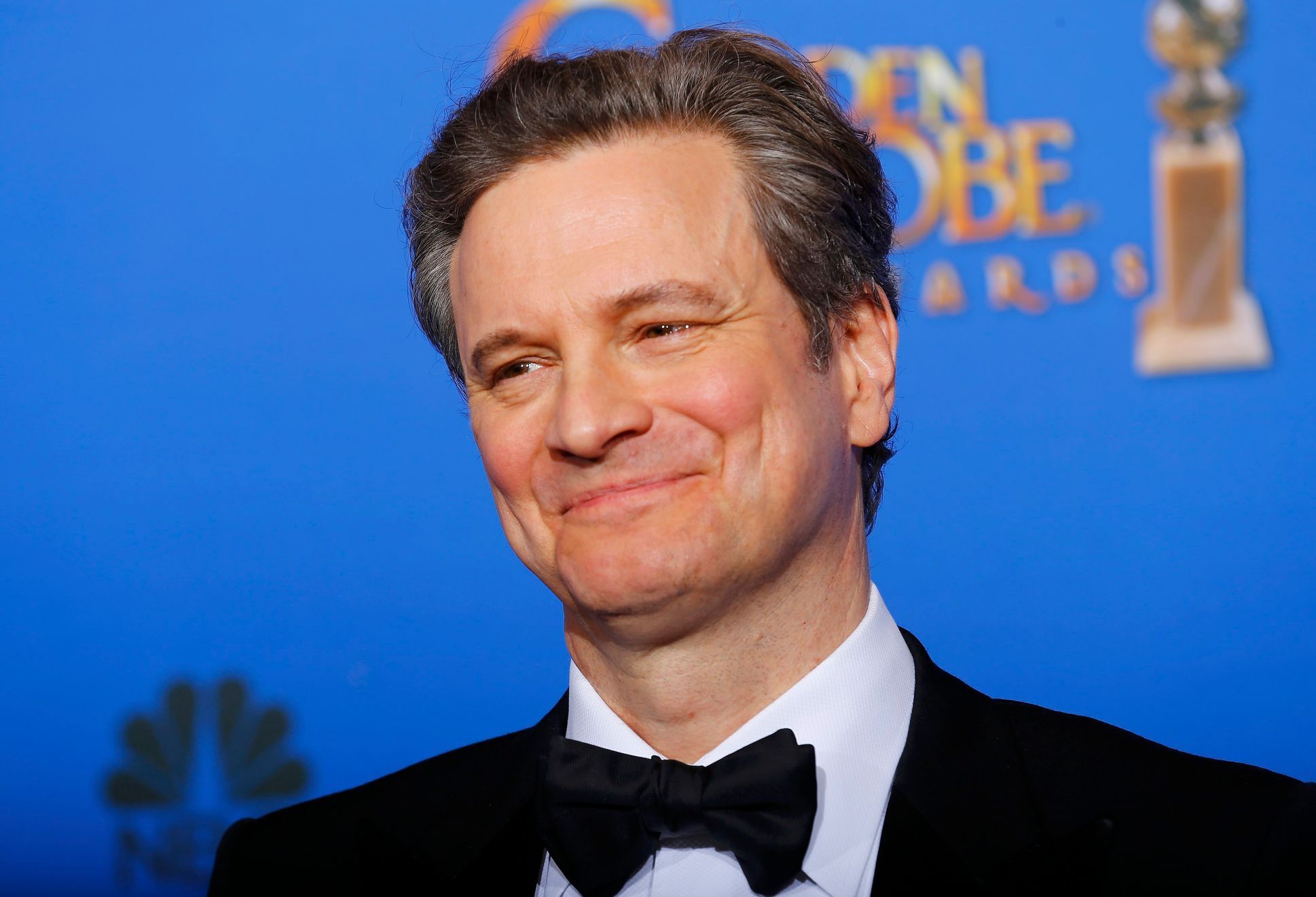 Colin Firth poses backstage during the 72nd Golden Globe Awards in Beverly Hills