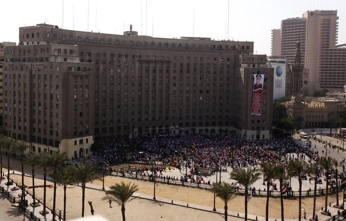 People gather in Tahrir square to celebrate the anniversary of an attack on Israeli forces during the 1973 war, in Cairo