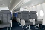 Interiér kabiny nového letadla Suchoj Superjet 100.
