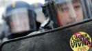 French riot gendarmes cordon the area as Arcelor Mittal workers from France and Belgium demonstrate next to the European Parliament in Strasbourg, February 6, 2013. Sticker reads, "Lorraine Steel Will Live". REUTERS/Christian Hartmann (FRANCE - Tags: POLITICS) Published: Úno. 6, 2013, 4:47 odp.