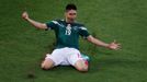 Mexico's Oribe Peralta celebrates after scoring a goal during their 2014 World Cup Group A match against Cameroon at Dunas arena in Natal June 13, 2014. REUTERS/Carlos Ba