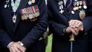 WWII D-Day veterans Richard Llewellyn and Mervyn Kersh from Britain attend a ceremony at Normandy American Cemetery and Memorial situated above Omaha Beach