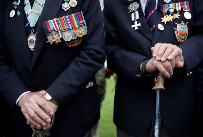 WWII D-Day veterans Richard Llewellyn and Mervyn Kersh from Britain attend a ceremony at Normandy American Cemetery and Memorial situated above Omaha Beach