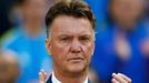 Netherlands coach Louis van Gaal claps at the 2014 World Cup Group B soccer match between Australia and Netherlands at the Beira Rio stadium in Porto Alegre June 18, 2014