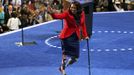 U.S. congressional candidate Tammy Duckworth (D-IL) walks off stage after addressing the opening session of the 2012 Democratic National Convention in Charlotte, North Carolina September 4, 2012. Duckworth lost both legs to injuries sustained while serving as a U.S. Army helicopter pilot in combat in Iraq. REUTERS/Jessica Rinaldi (UNITED STATES - Tags: POLITICS ELECTIONS) Published: Zář. 5, 2012, 1:26 dop.