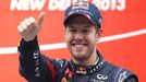 Red Bull Formula One driver Sebastian Vettel of Germany celebrates on the podium after winning the Indian F1 Grand Prix at the Buddh International Circuit in Greater Noid