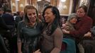 Mercedes Santos (2nd L) and partner Theresa Volpe (L) are congratulated on the results of a vote by the Senate Executive Committee on same-sex marriages as their friends Becky Crawford (2nd R) and Peggy Cloonan celebrate at the Illinois State Legislature in Springfield, Illinois, January 3, 2013. The Commitee voted 8-5 to send the bill to a full vote in the Senate. Picture taken January 3, 2013. REUTERS/Jim Young (UNITED STATES - Tags: SOCIETY) Published: Bře. 25, 2013, 6:07 odp.