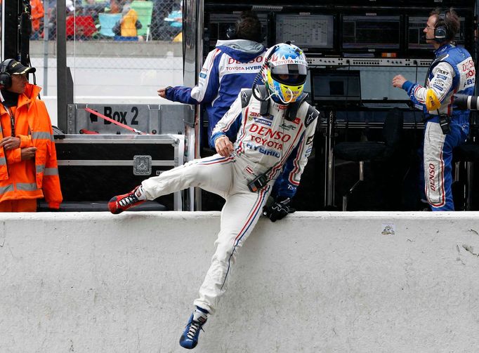 Toyota TS030 driver Alexander Wurz of Austria is seen in the pit lane during the Le Mans 24-hour sportscar race in Le Mans, central France June 22, 2013. REUTERS/Stephane