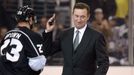 Jun 4, 2014; Los Angeles, CA, USA; Los Angeles Kings former player Wayne Gretzky waves to the crowd after the ceremonial puck drop before game one of the 2014 Stanley Cup