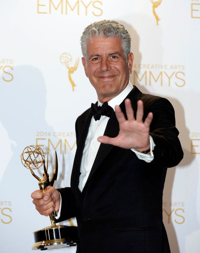 Anthony Bourdain poses backstage with the Emmy for Outstanding Informational Series &quot;Anthony Bourdain: Parts Unknown&quot; in Los Angeles