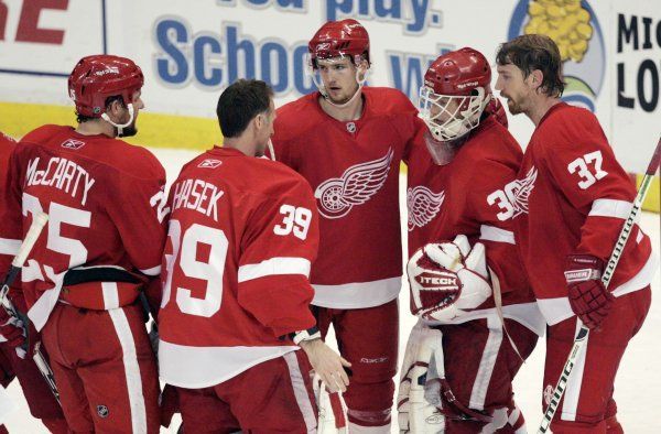 Chris Osgood a Dominik Hašek