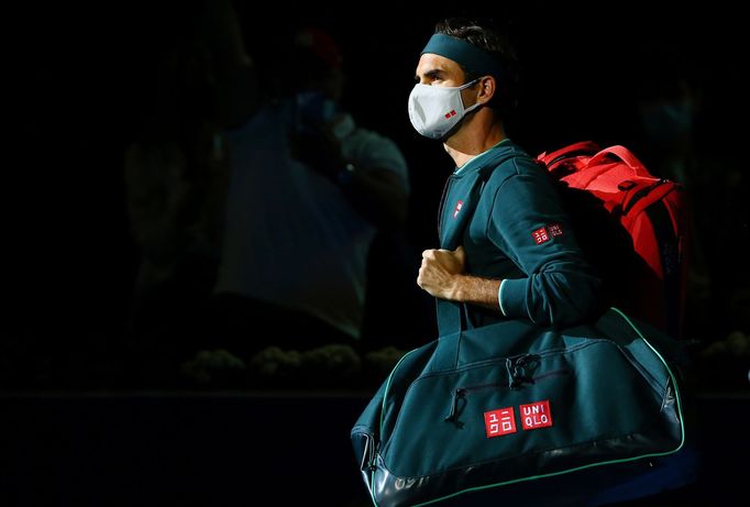 Tennis - ATP 250 - Qatar Open - The Khalifa International Tennis and Squash Complex, Doha, Qatar - March 10, 2021  Switzerland's Roger Federer wearing a mask as he walks