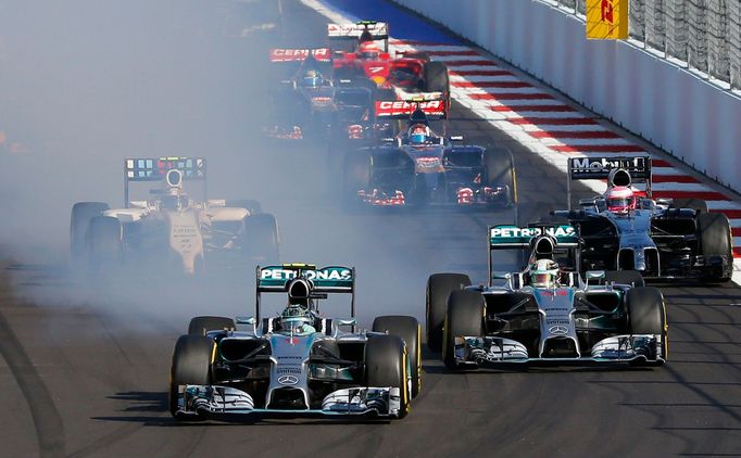 Mercedes Formula One driver Nico Rosberg of Germany leads nect to Mercedes Formula One driver Lewis Hamilton of Britain (R) after the start of the first Russian Grand Pri