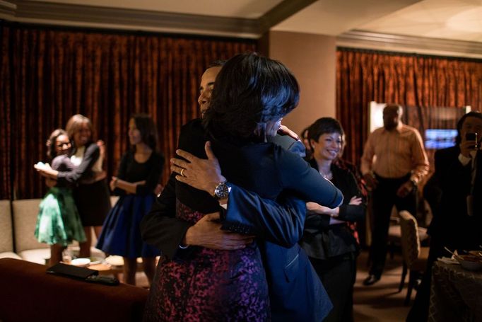 Nov. 6, 2012 (Election Day) "The Obama family and close friends were watching election results at a Chicago hotel. The President had warned everyone that it could be a very late night. Yet, only a few minutes later, the networks projected that he had been re-elected, and the President embraced the First Lady, while in the background, daughter Sasha hugged one of her cousins."