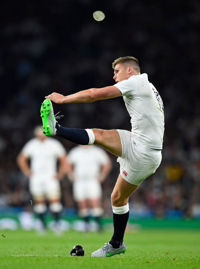 Owen Farrell of England kicks at goal